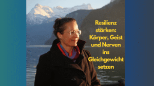 Petra steht am Vierwaldstättersee und denkt über Resilienz stärken nach